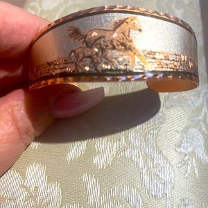 Copper horse motif slip on bracelet